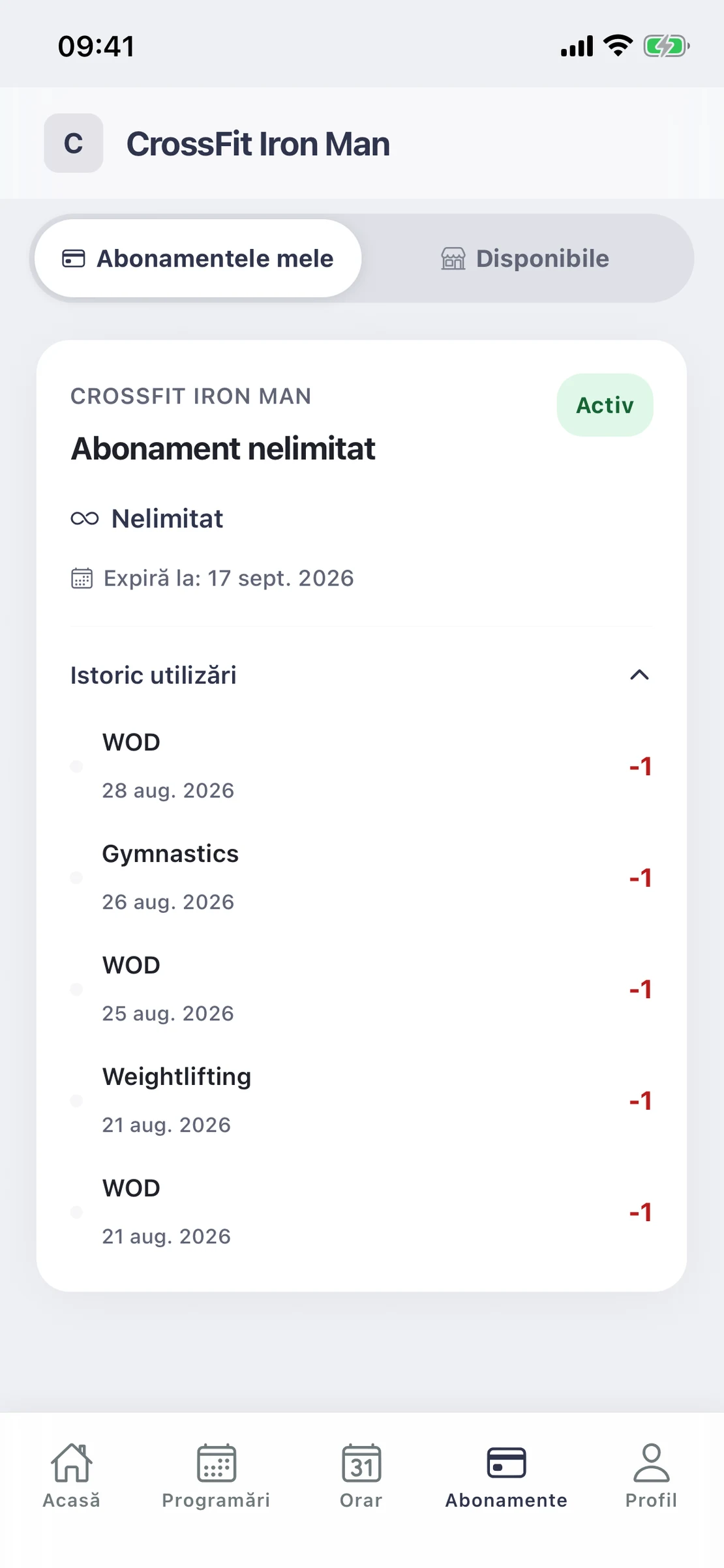 Ecranul de abonamente afișează un abonament nelimitat activ, data expirării și istoricul antrenamentelor WOD, Gymnastics și Weightlifting.