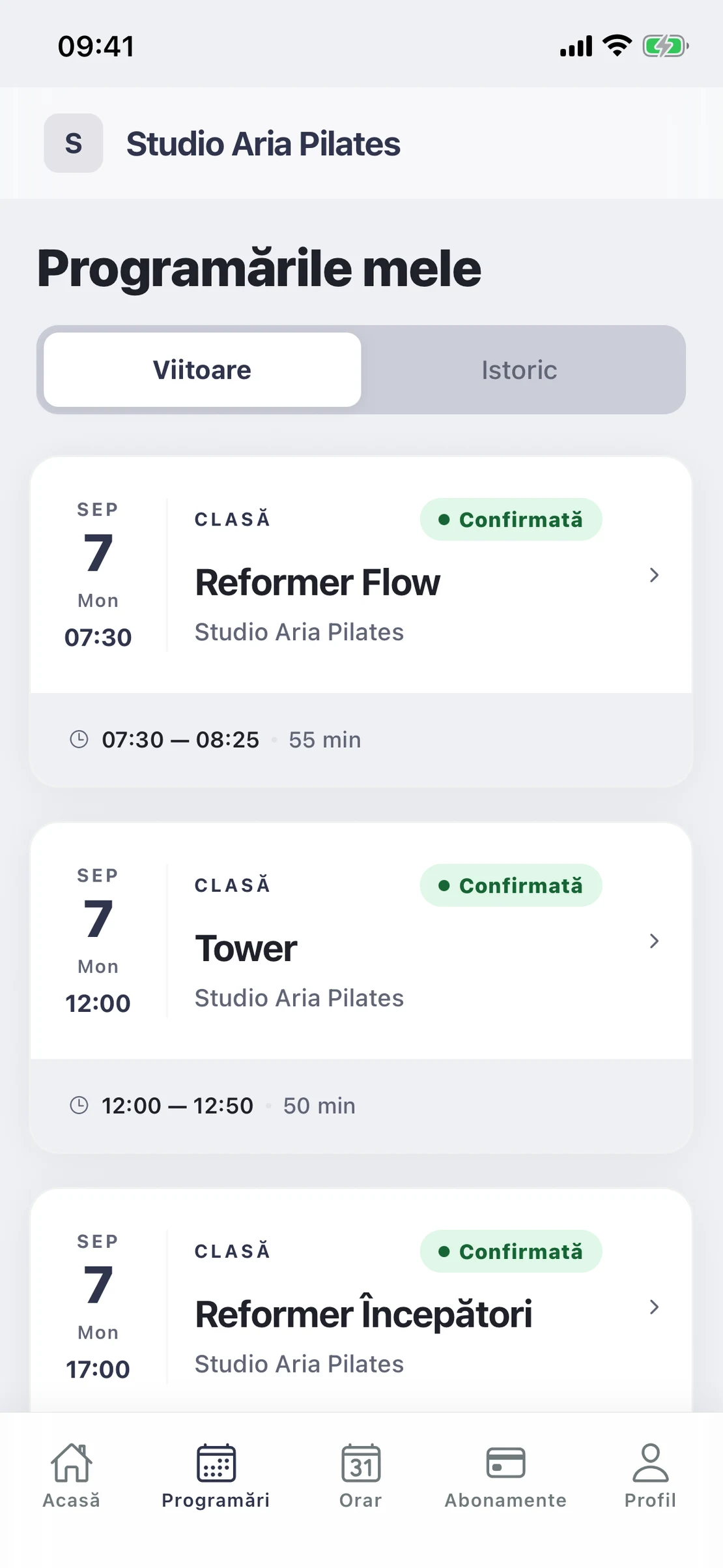 Ecranul „Programările mele” afișează trei clase de Pilates confirmate în aceeași zi: Reformer Flow, Mat Pilates și Tower.